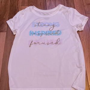 The color is white. The size is medium eight in girls. The brand is tek gear